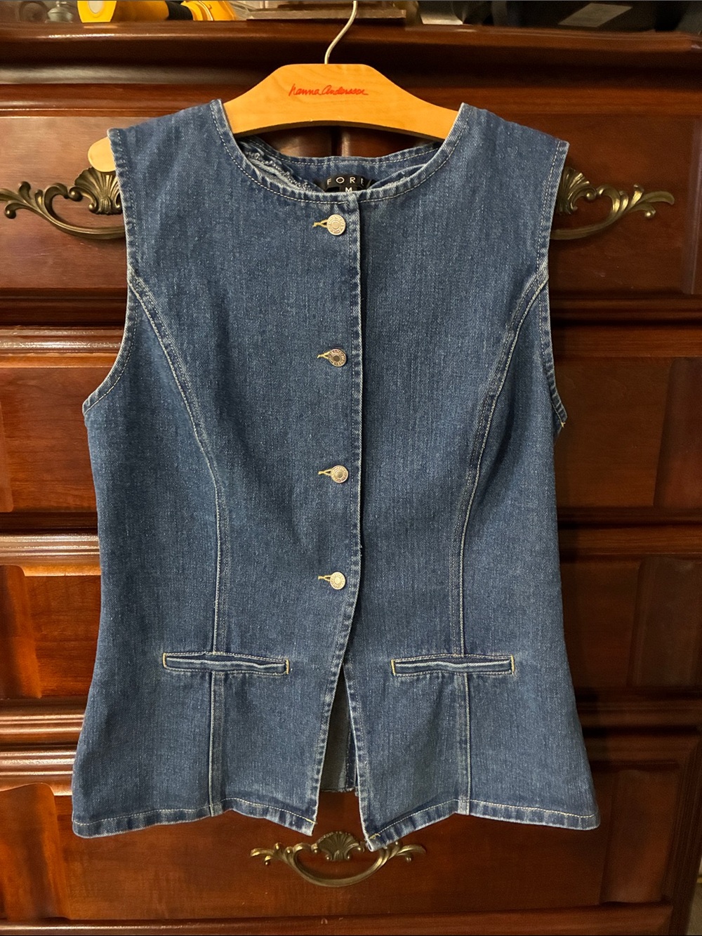 FORE Women’s Longline Denim Vest in a flattering fitted silhouette.